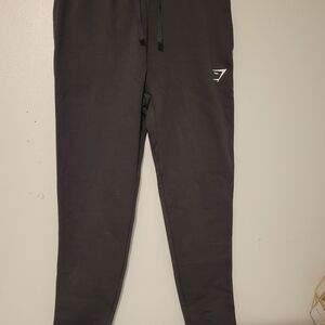 GYMSHARK Charcoal Joggers with Logo.‎